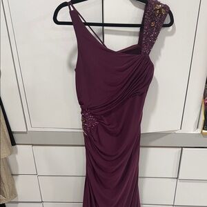 Elegant purple  dress by LM Collection. Perfect for special occasions.